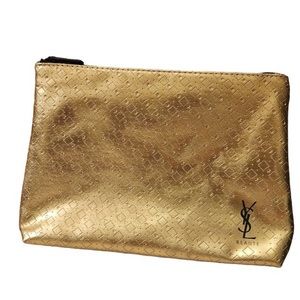 Yves Saint Laurent gold make up bag